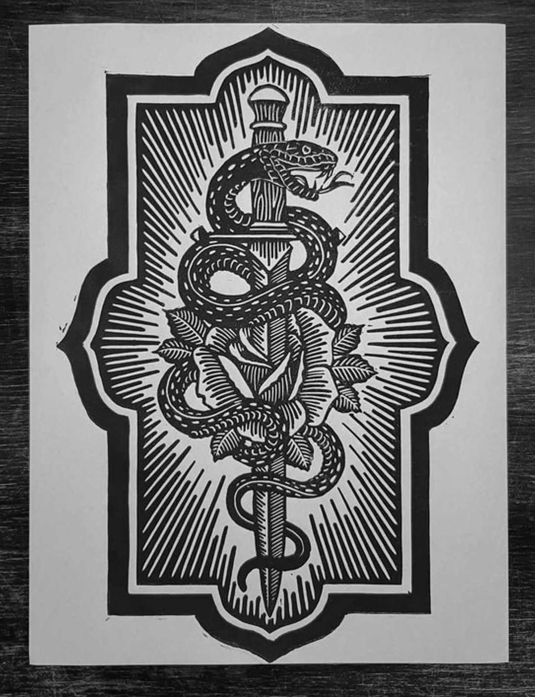 Dagger, snake and rose