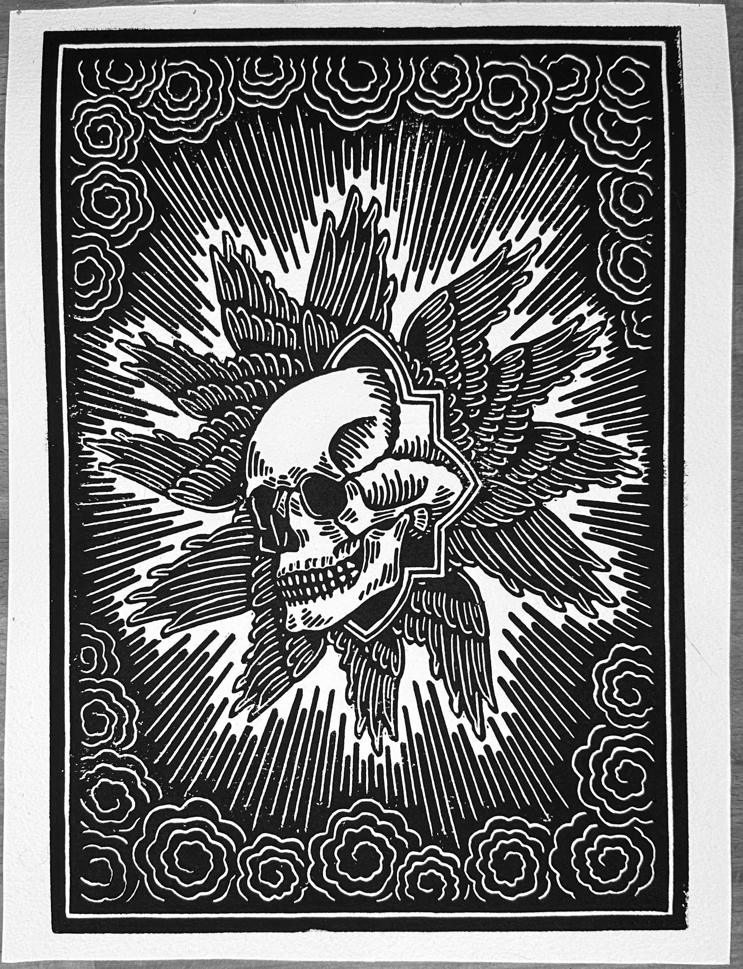 Skull and a bunch of wings